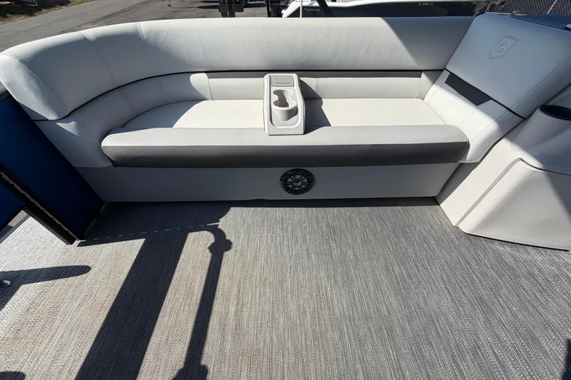 Slide: The Image of Interior seating of 2022 Godfrey Sweetwater 2286FS pontoon boat with cup holder. - 13