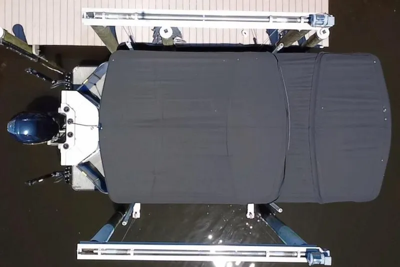 Slide: The Image of Overhead view of a 2022 Godfrey Sweetwater 2286FS boat docked. - 21