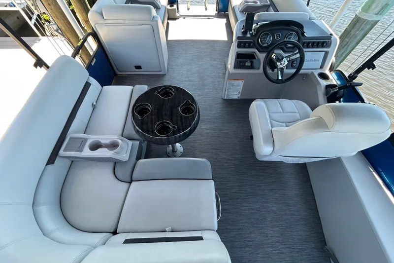 Slide: The Image of Interior of 2022 Godfrey Sweetwater 2286FS pontoon boat with seating and steering console. - 29