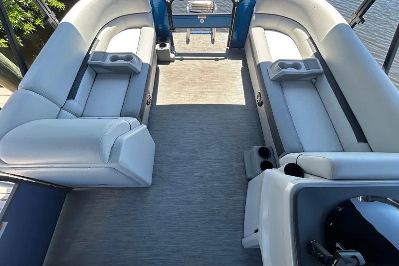 Slide: The Image of Interior of 2022 Godfrey Sweetwater 2286FS pontoon boat with spacious seating and cup holders. - 33