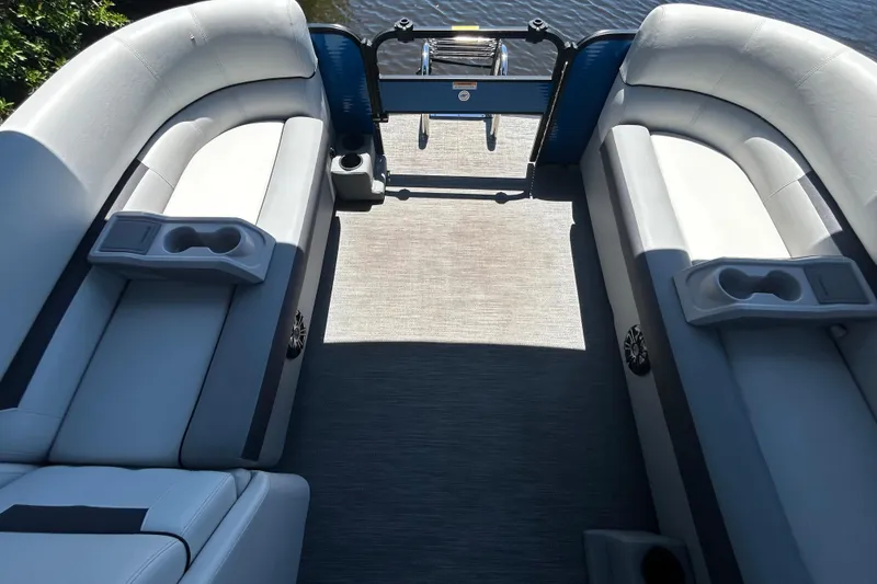 Slide: The Image of Interior of 2022 Godfrey Sweetwater 2286FS pontoon boat with comfortable seating and cup holders. - 35