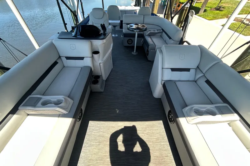 Slide: The Image of Interior of 2022 Godfrey Sweetwater 2286FS pontoon boat with spacious seating and modern design. - 40