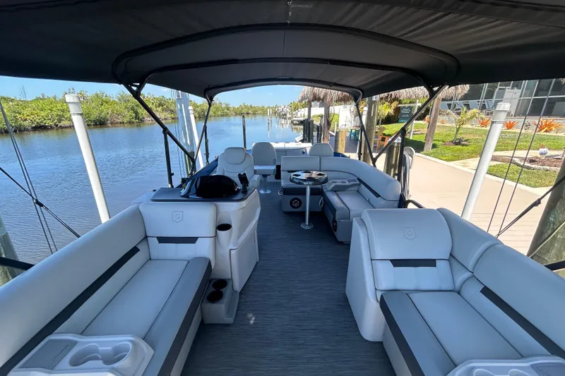 Slide: The Image of Interior view of 2022 Godfrey Sweetwater 2286FS pontoon boat with spacious seating. - 41