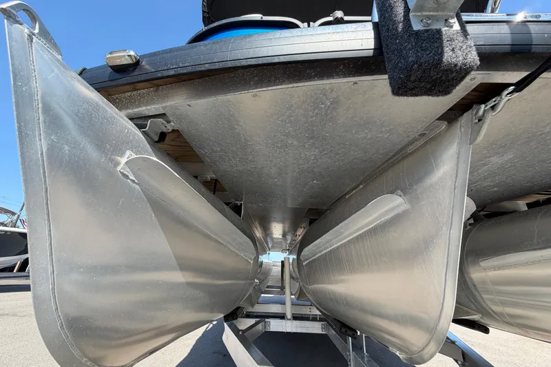 Slide: The Image of Underneath view of a 2022 Godfrey Sweetwater 2286FS pontoon boat on a trailer. - 9