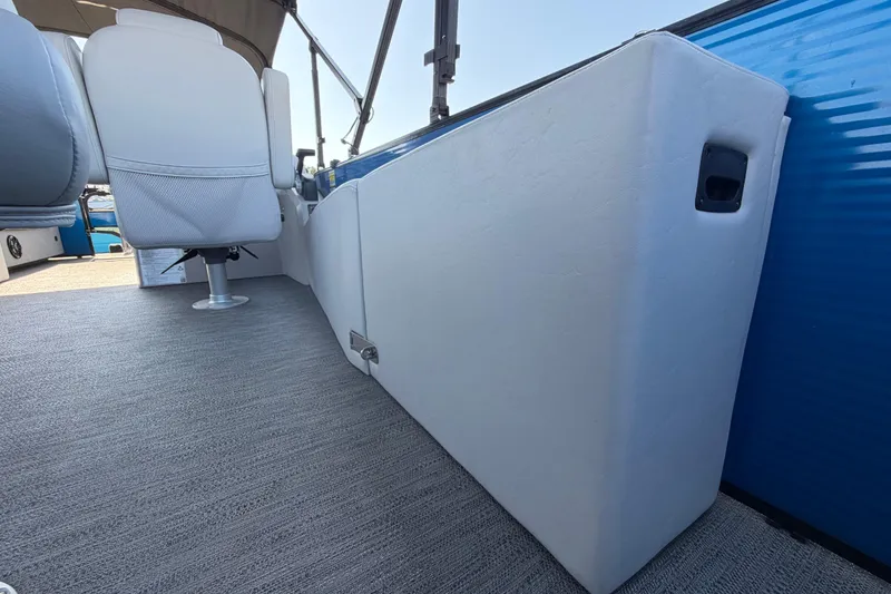 Slide: The Image of Interior view of 2022 Godfrey Sweetwater 2286FS boat, featuring seating and carpeted flooring. - 69