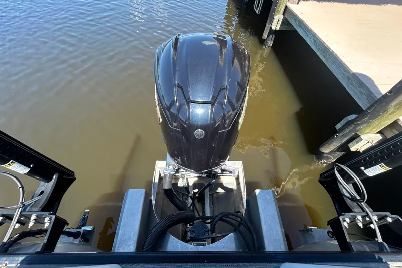 Slide: The Image of Outboard motor of 2022 Godfrey Sweetwater 2286FS pontoon boat docked on water. - 54