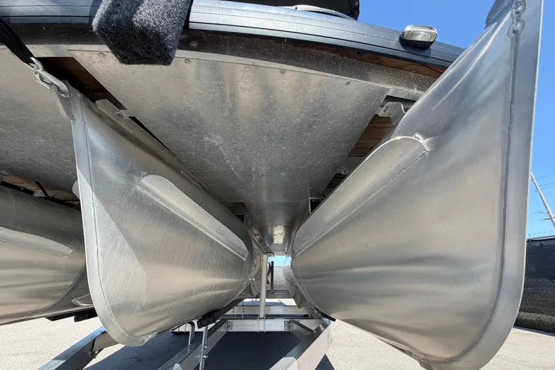 Slide: The Image of Underneath view of 2022 Godfrey Sweetwater 2286FS pontoon boat on trailer. - 8