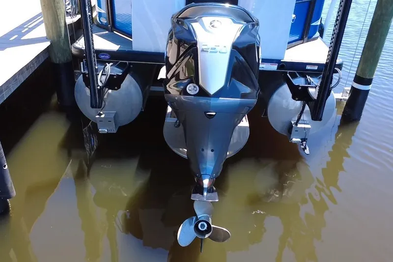 Slide: The Image of 2022 Godfrey Sweetwater 2286FS boat with outboard motor in water. - 6