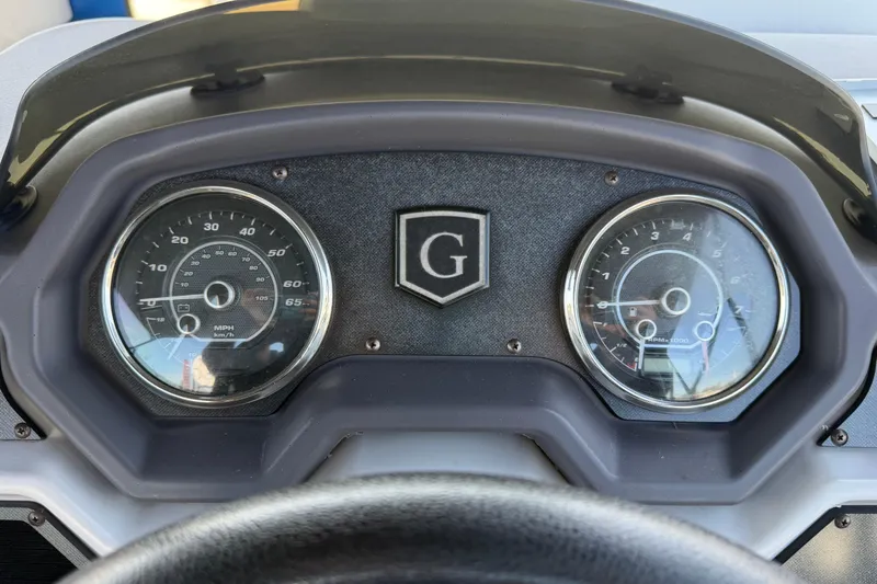 Slide: The Image of Dashboard of 2022 Godfrey Sweetwater 2286FS boat with speedometer and tachometer. - 29