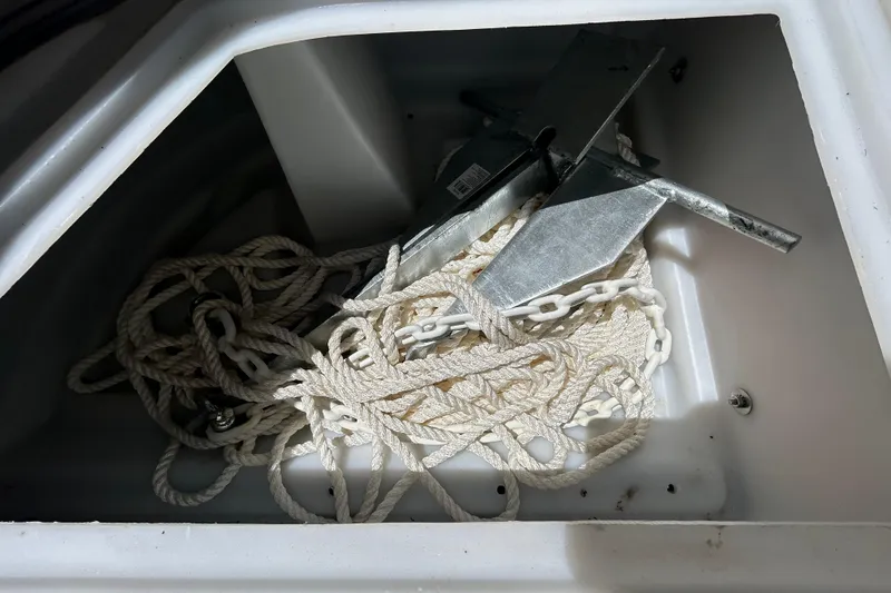 Slide: The Image of Anchor and rope storage in 2022 Godfrey Sweetwater 2286FS boat compartment. - 64