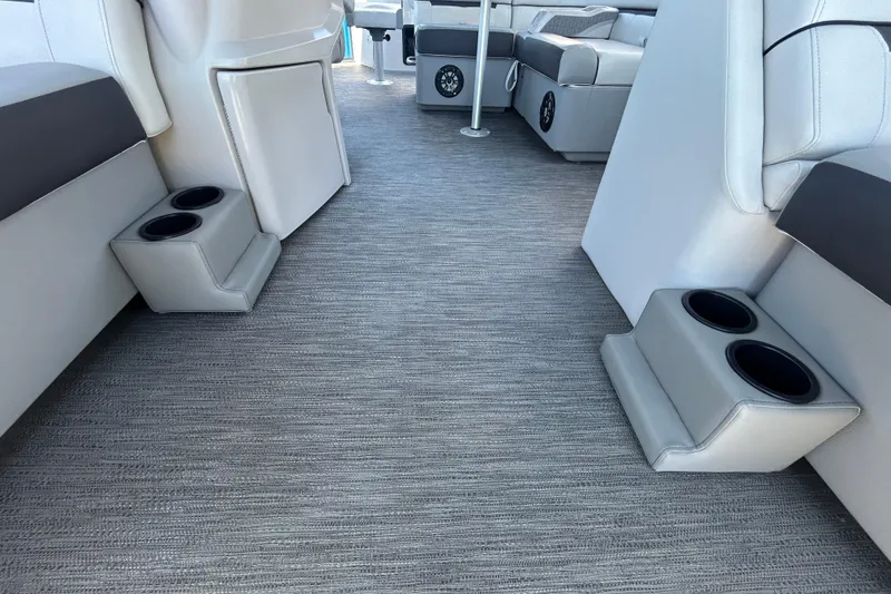 Slide: The Image of Interior of 2022 Godfrey Sweetwater 2286FS pontoon boat with cup holders and seating. - 68