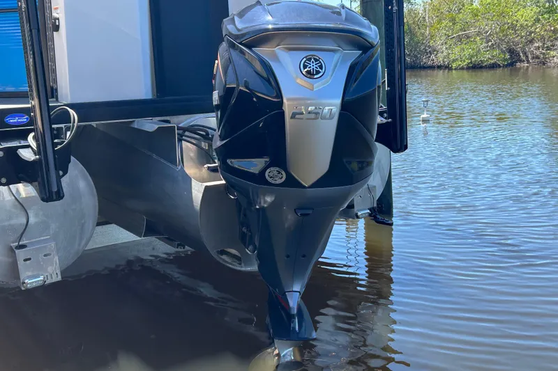 Slide: The Image of Yamaha 250 outboard motor on 2022 Godfrey Sweetwater 2286FS pontoon boat in water. - 7
