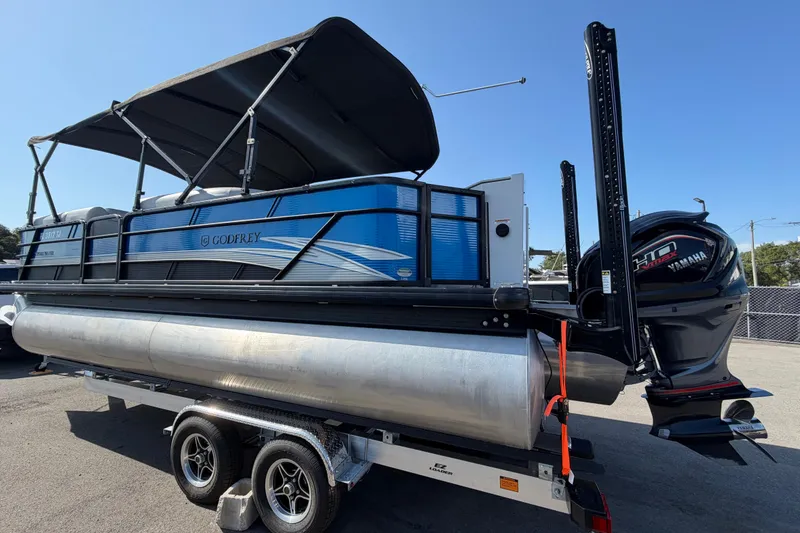 Slide: The Image of 2022 Godfrey Sweetwater 2286FS pontoon boat with Yamaha motor on trailer. - 4