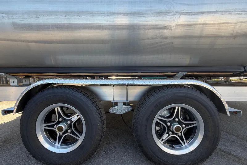 Slide: The Image of Trailer wheels of a 2022 Godfrey Sweetwater 2286FS pontoon boat. - 83