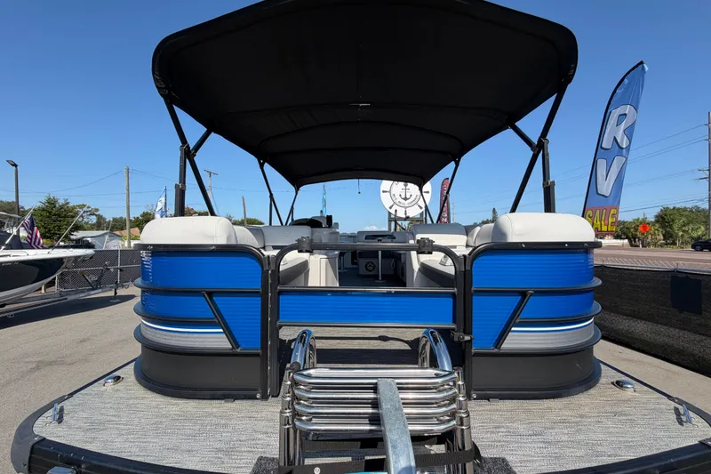 Slide: The Image of 2022 Godfrey Sweetwater 2286FS pontoon boat with blue exterior and canopy. - 10
