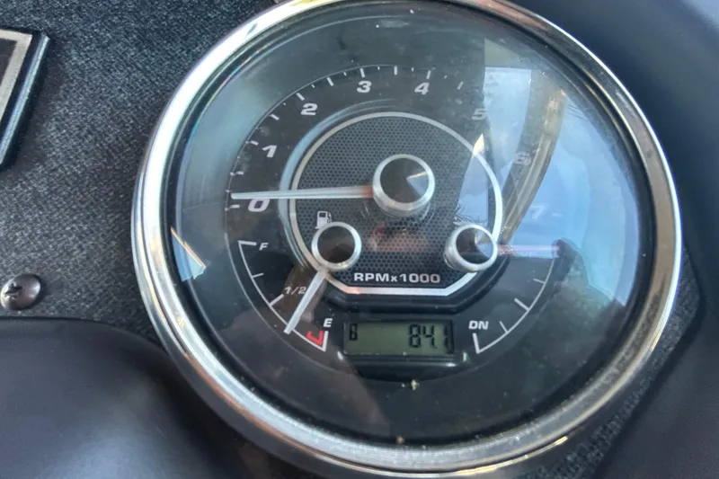 Slide: The Image of Close-up of 2022 Godfrey Sweetwater 2286FS tachometer showing RPM and fuel gauge. - 85