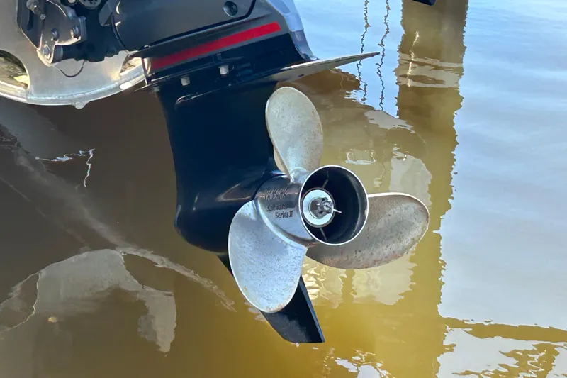 Slide: The Image of Propeller of a 2022 Godfrey Sweetwater 2286FS boat in water. - 9
