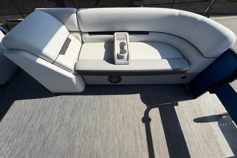 Slide: The Image of Luxurious seating on 2022 Godfrey Sweetwater 2286FS pontoon boat with cup holders. - 16