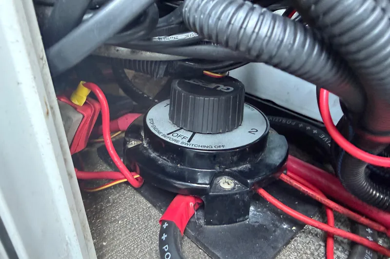 Slide: The Image of Battery switch and wiring in 2022 Godfrey Sweetwater 2286FS boat. - 57