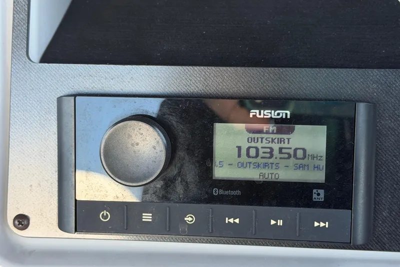 Slide: The Image of Fusion radio display on 2022 Godfrey Sweetwater 2286FS, tuned to 103.50 MHz FM. - 28