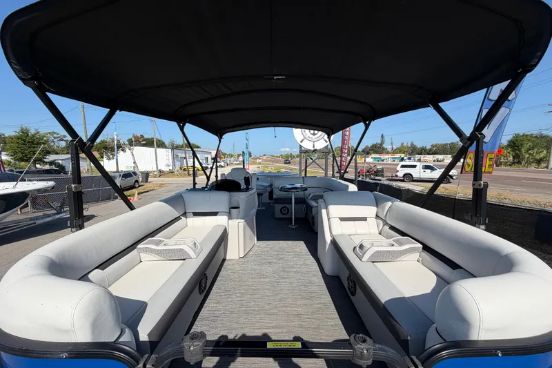 Slide: The Image of Interior view of 2022 Godfrey Sweetwater 2286FS pontoon boat with spacious seating and canopy. - 11