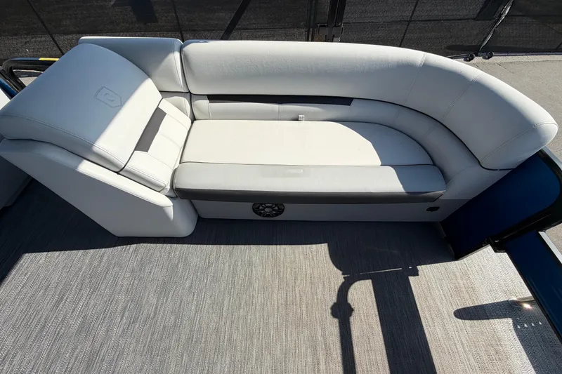 Slide: The Image of Luxurious seating on 2022 Godfrey Sweetwater 2286FS pontoon boat, featuring plush upholstery. - 17