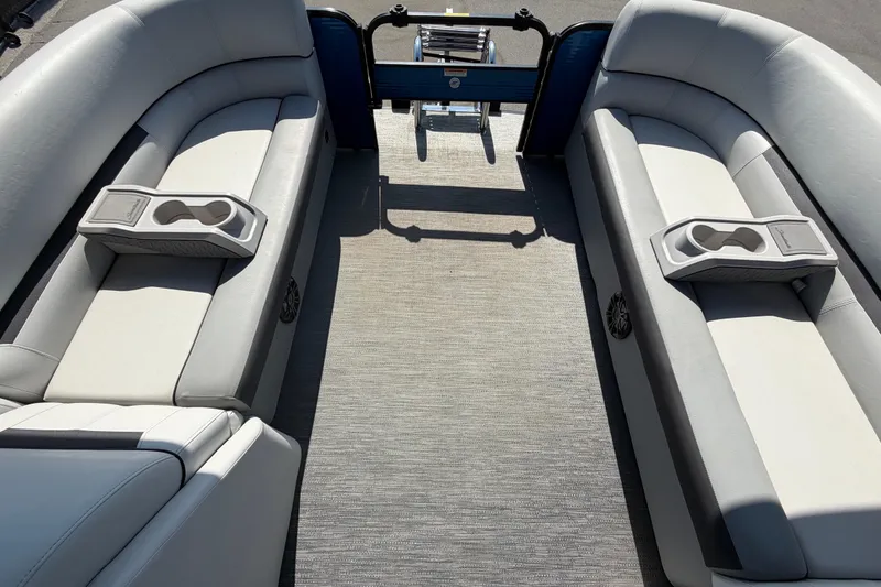 Slide: The Image of Interior of 2022 Godfrey Sweetwater 2286FS pontoon boat with cushioned seating and cup holders. - 76