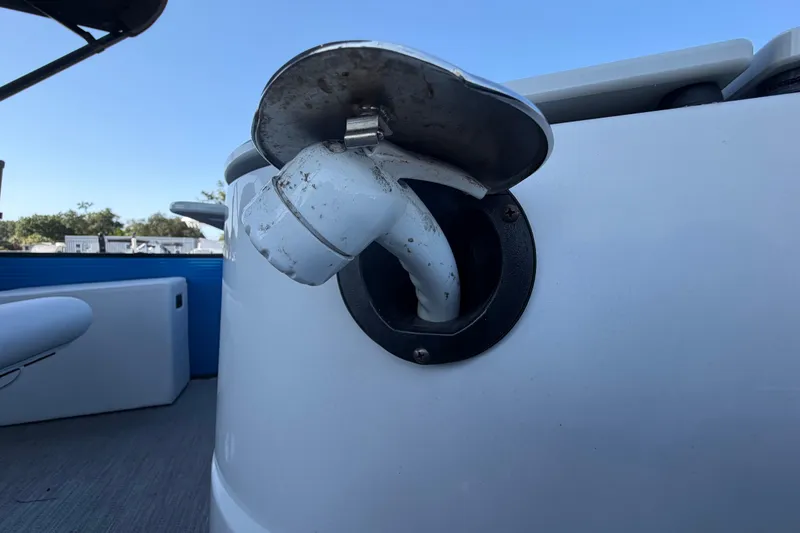 Slide: The Image of Fuel cap on a 2022 Godfrey Sweetwater 2286FS pontoon boat, close-up view. - 59