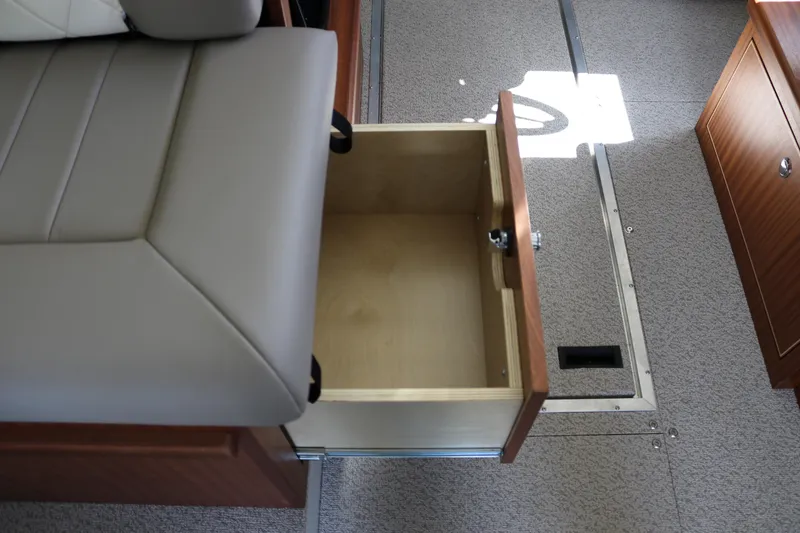 Slide: The Image of Open storage drawer in 2026 KingFisher 3425 GFX Offshore boat interior. - 16