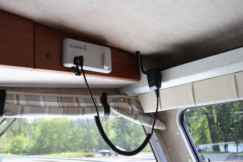 Slide: The Image of Interior of 2026 KingFisher 3425 GFX Offshore with Garmin device and microphone. - 21