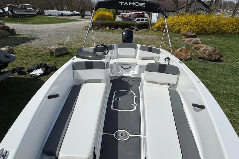 Slide: The Image of 2025 Tahoe T18 boat with sleek interior design and comfortable seating. - 10
