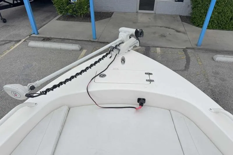 Slide: The Image of Bow of 2023 Pathfinder 2600 HPS boat with trolling motor in parking lot. - 15