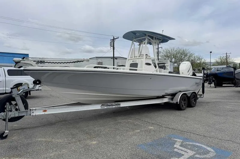 Slide: The Image of 2023 Pathfinder 2600 HPS boat on trailer in parking lot. - 3