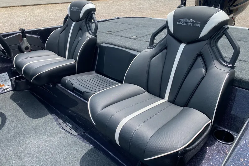 Slide: The Image of 2026 Skeeter ZXE20 boat interior with sleek, modern seating design. - 9
