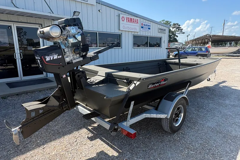 Slide: The Image of 2026 Gator Tail 1748 Gator Series boat on trailer outside dealership. - 4