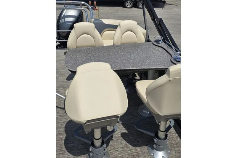 Slide: The Image of Interior seating of 2025 Godfrey Sweetwater 2286 MT pontoon boat with table. - 10