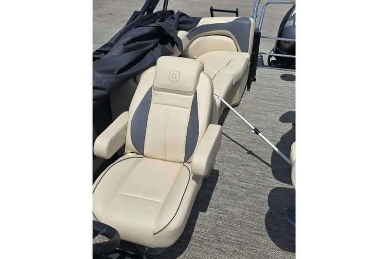 Slide: The Image of Luxurious seating on 2025 Godfrey Sweetwater 2286 MT pontoon boat, featuring beige upholstery. - 11