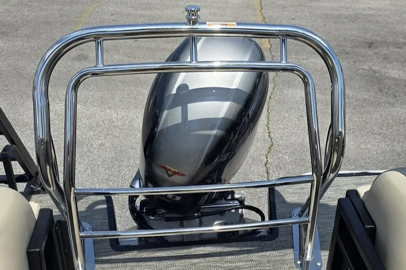 Slide: The Image of Rear view of 2025 Godfrey Sweetwater 2286 MT boat with shiny metal railing and motor. - 8