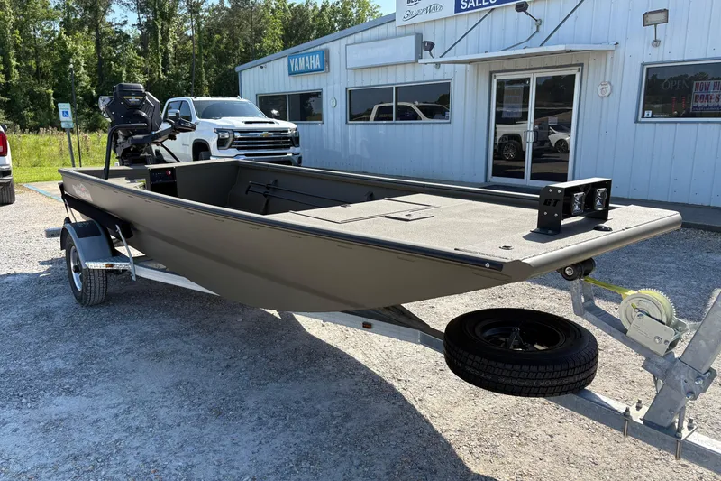 Slide: The Image of 2026 Gator Tail 1748 Gator Series boat on trailer outside dealership. - 5