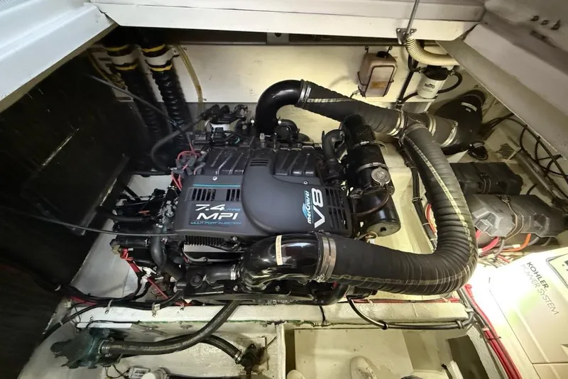 Slide: The Image of Engine compartment of a 1998 Maxum 3700 SCR with a 7.4 MPI V8 engine. - 60