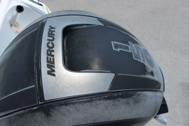 Slide: The Image of Close-up of a Mercury outboard motor on a Glasstream 240 CCX boat. - 10