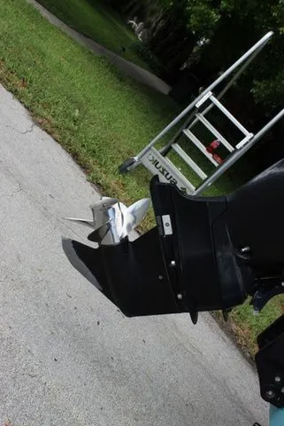 Slide: The Image of 2018 Glasstream 240 CCX outboard motor and propeller. - 12
