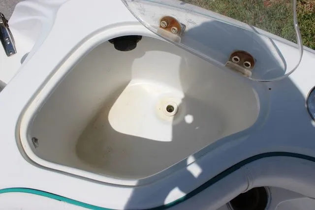Slide: The Image of Glasstream 240 CCX 2018 boat, empty compartment with drain. - 28