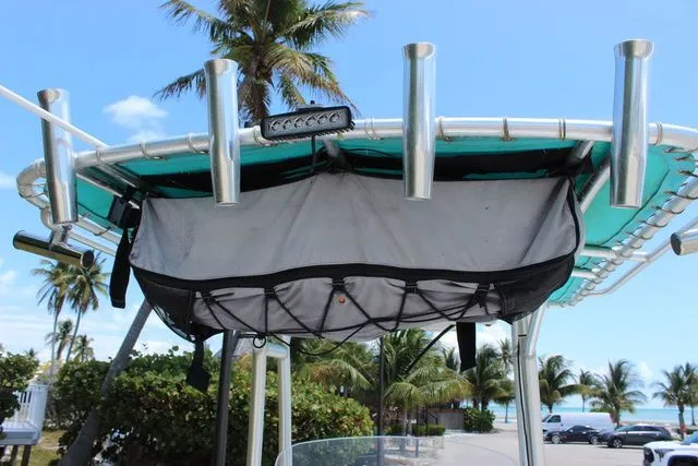 Slide: The Image of 2018 Glasstream 240 CCX boat with rod holders and storage. - 31