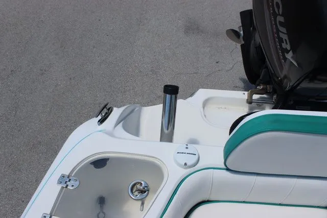 Slide: The Image of Glasstream 240 CCX 2018 boat rear with motor and seating area. - 37