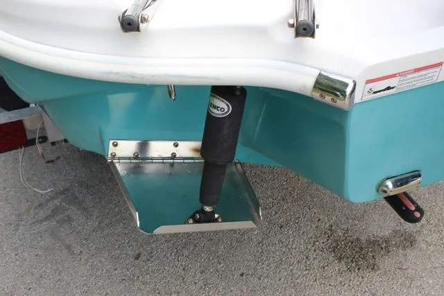 Slide: The Image of Rear view of 2018 Glasstream 240 CCX boat with trim tab. - 46
