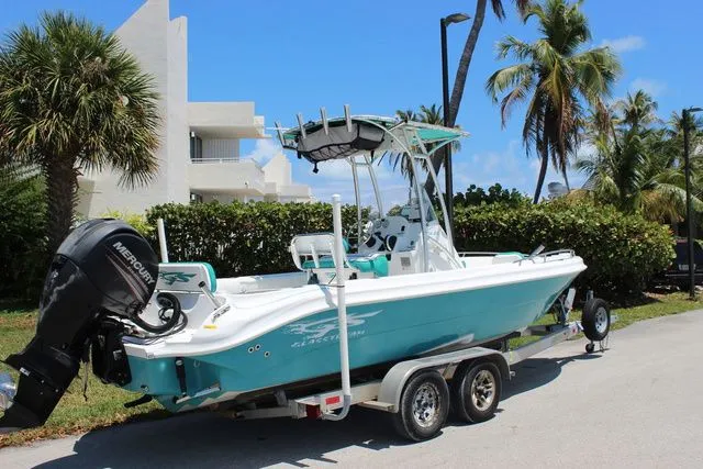 Slide: The Image of 2018 Glasstream 240 CCX boat on trailer, tropical setting. - 5