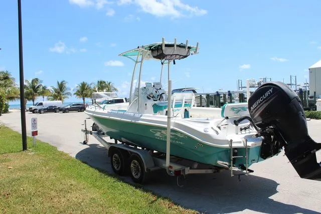 Slide: The Image of 2018 Glasstream 240 CCX boat on trailer by the beach. - 6