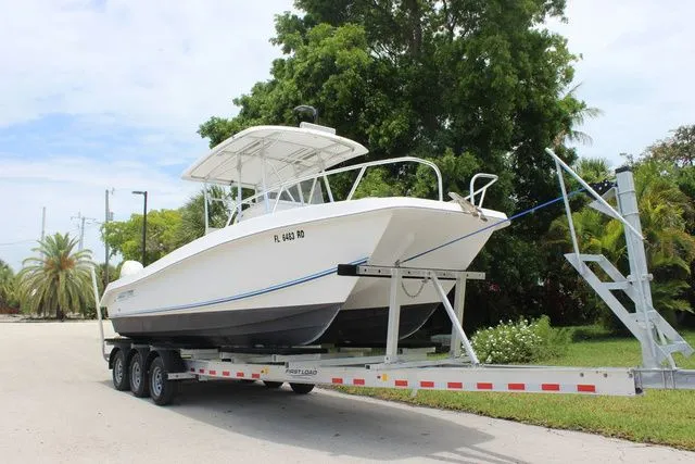 The Image of 2017 Twin Vee OceanCat 260 TE on trailer, ready for adventure. - 1