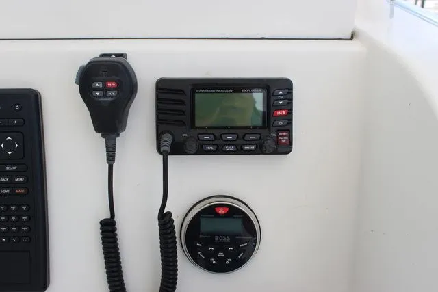 Slide: The Image of Control panel of 2017 Twin Vee OceanCat 260 TE with radio equipment. - 17